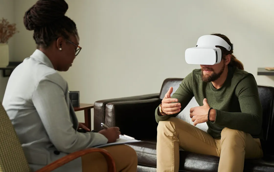 A therapist guiding a patient through a virtual reality session
